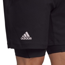 adidas Spodenki tenisowe US Series Aero.Ready 2w1 (Krótki+Obcisły) 7cal czarny Mężczyźni